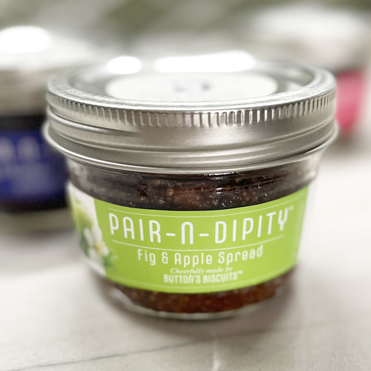 Jar of Pair-N-Dipity Fig & Apple Spread on a countertop